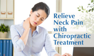 image of woman holding her sore neck