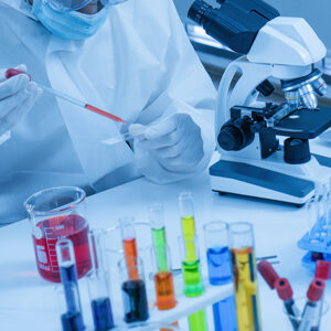 image of a lab with test tubes and microscope