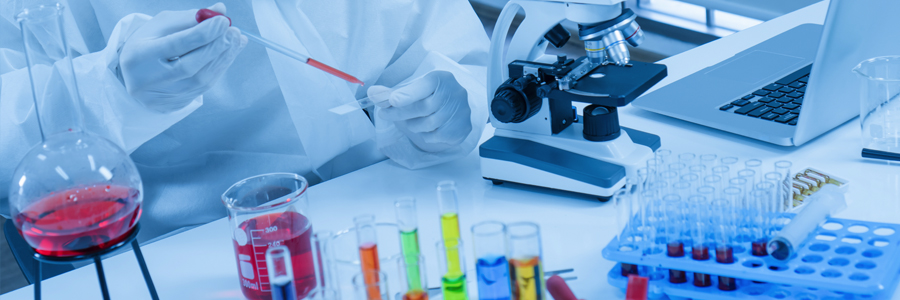 image of a lab with test tubes and microscope